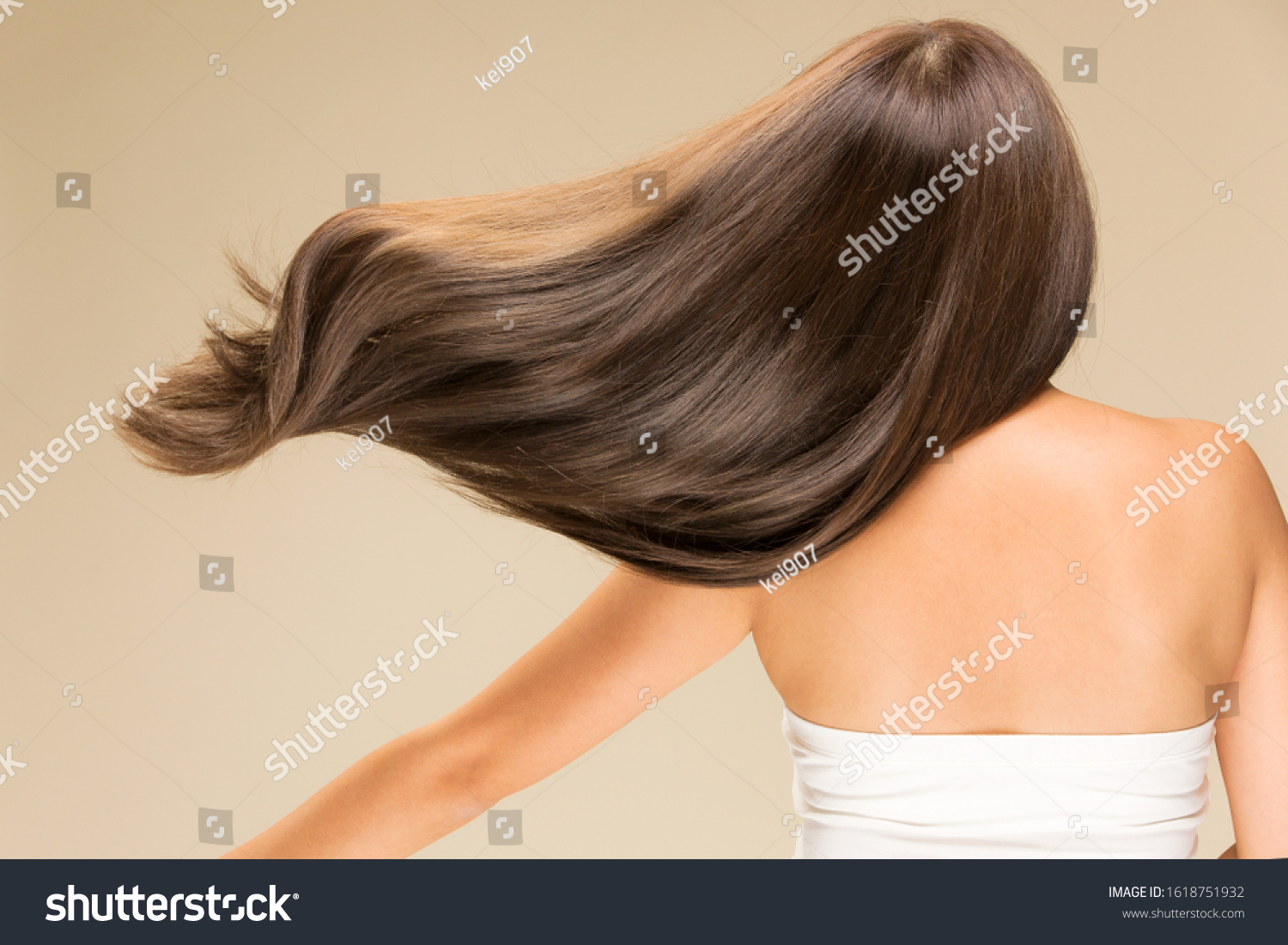 Lively hair on a beige background. #1618751932