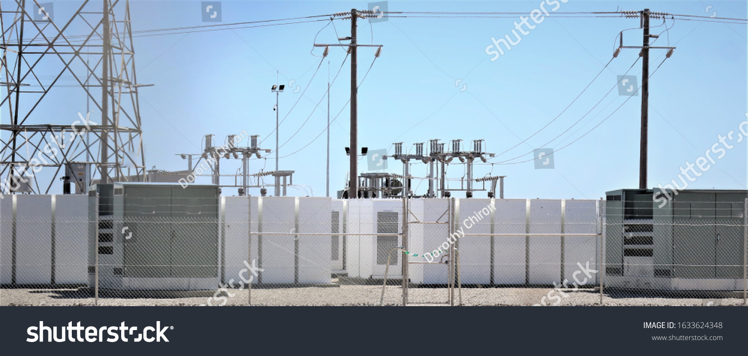 Battery storage at a Solar Farm with switchgear or switch gear in the background #1633624348