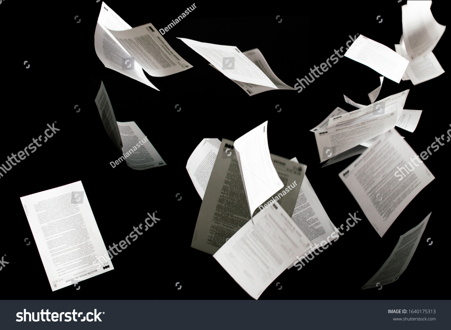 Many flying business documents isolated on black background Papers flying in air in business concept #1640175313
