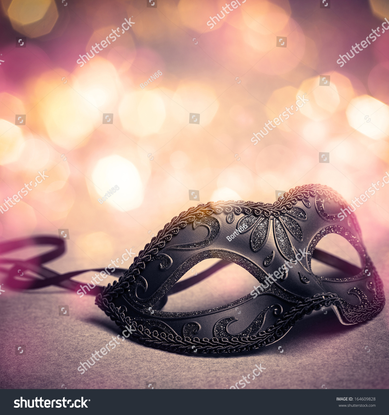 carnival mask over gold background #164609828