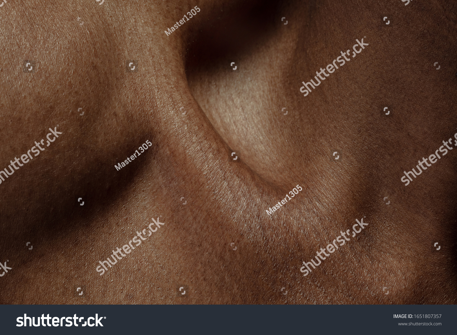 Collarbones. Detailed texture of human skin. Close up shot of young african-american male body. Skincare, bodycare, healthcare, hygiene and medicine concept. Looks beauty and well-kept. Dermatology. #1651807357