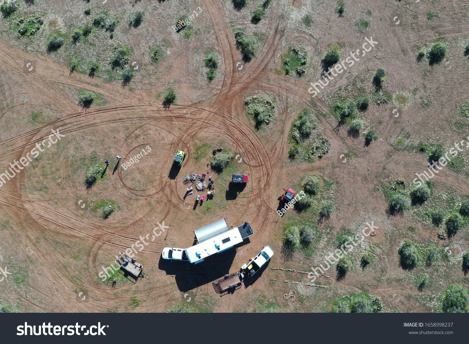 Aerial view of campers boondocking in the desert. #1658998237