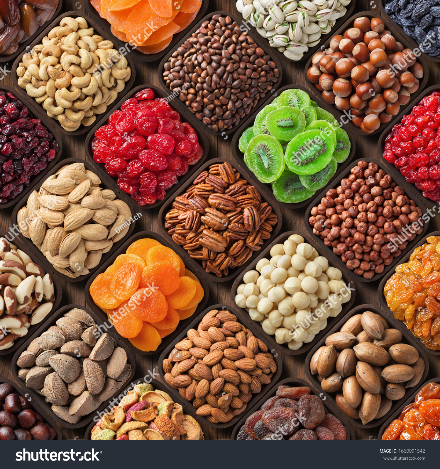 assorted candied berries, dried fruits, nuts and seeds, top view. healthy food background #1660991542