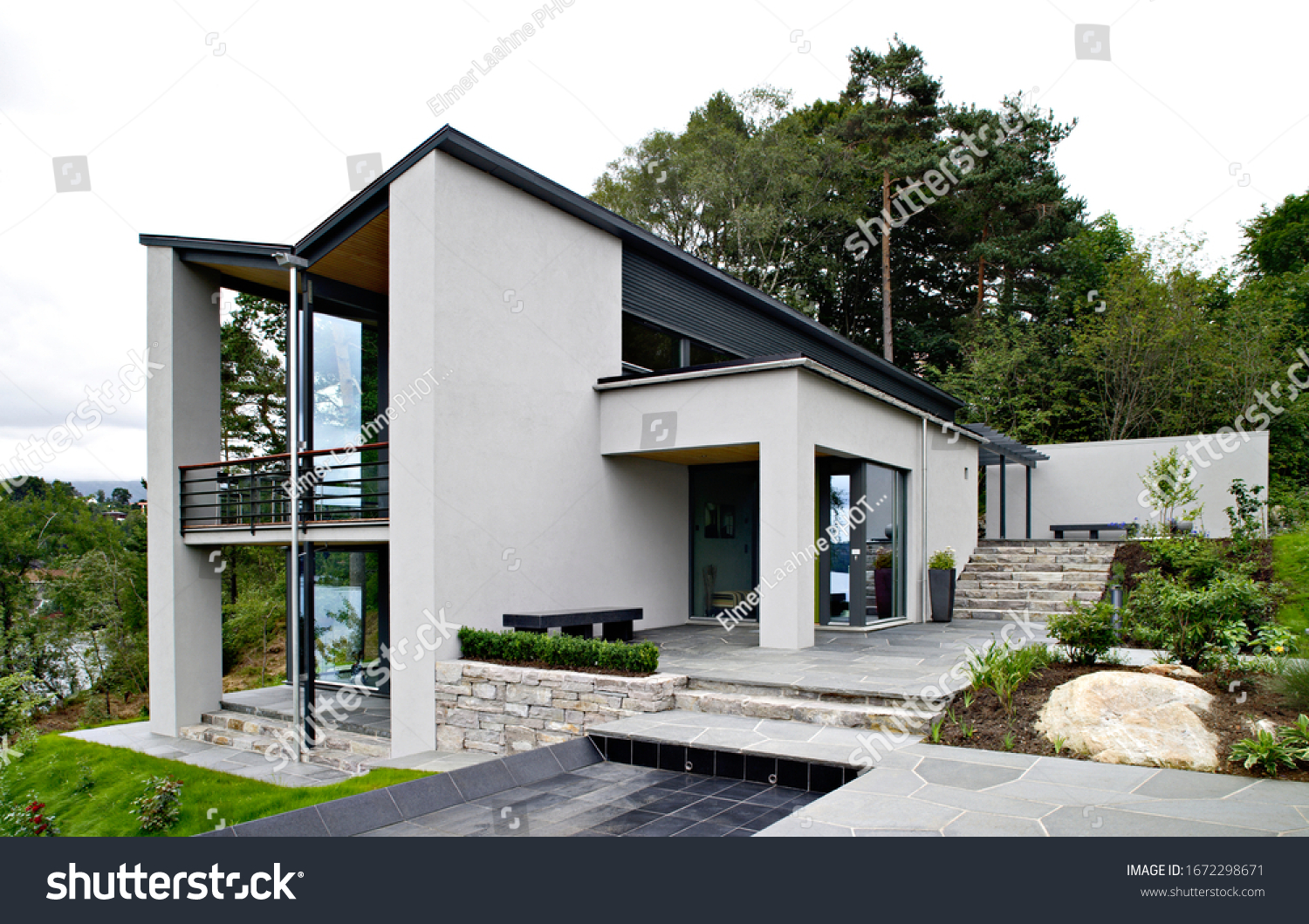 Front view of modern designed concrete residential house in western Norway #1672298671