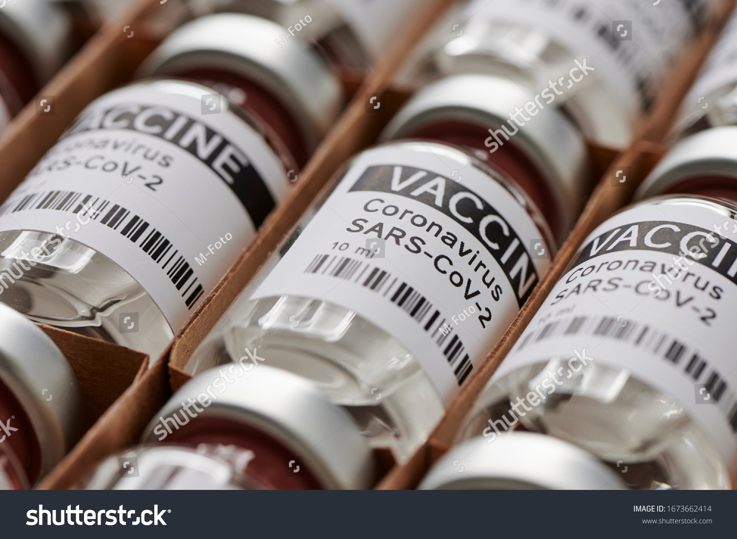 coronavirus vaccine. sars-cov-2  COVID-19. Some ampoules with ncov-2019 vaccine in a box. to fight the coronavirus pandemic. #1673662414