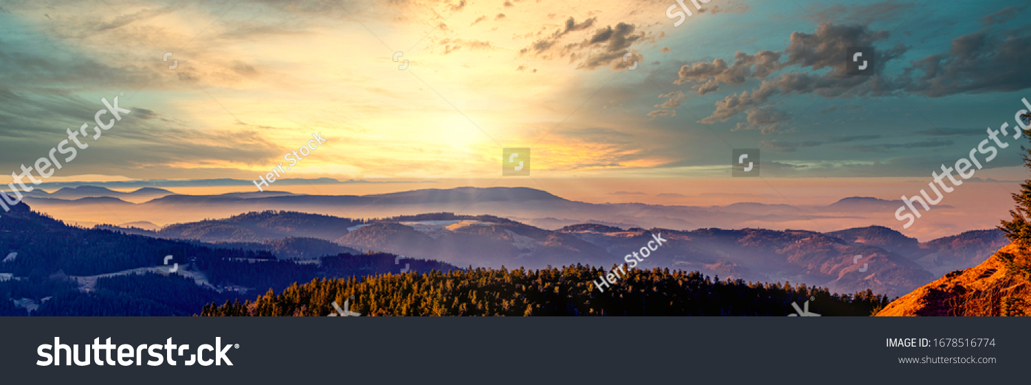 Panorama of the mountain landscape in the Northern Black Forest at sunrise #1678516774