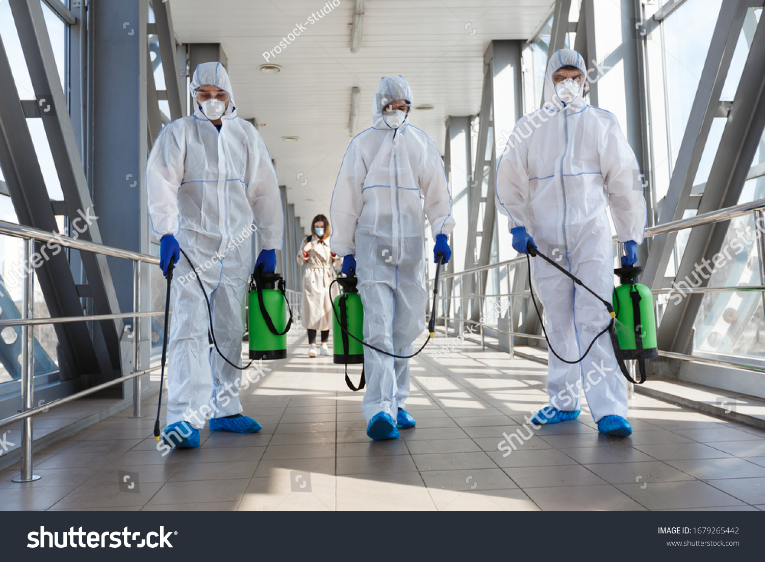 Specialist in hazmat suits cleaning disinfecting coronavirus cells epidemic, pandemic health risk #1679265442