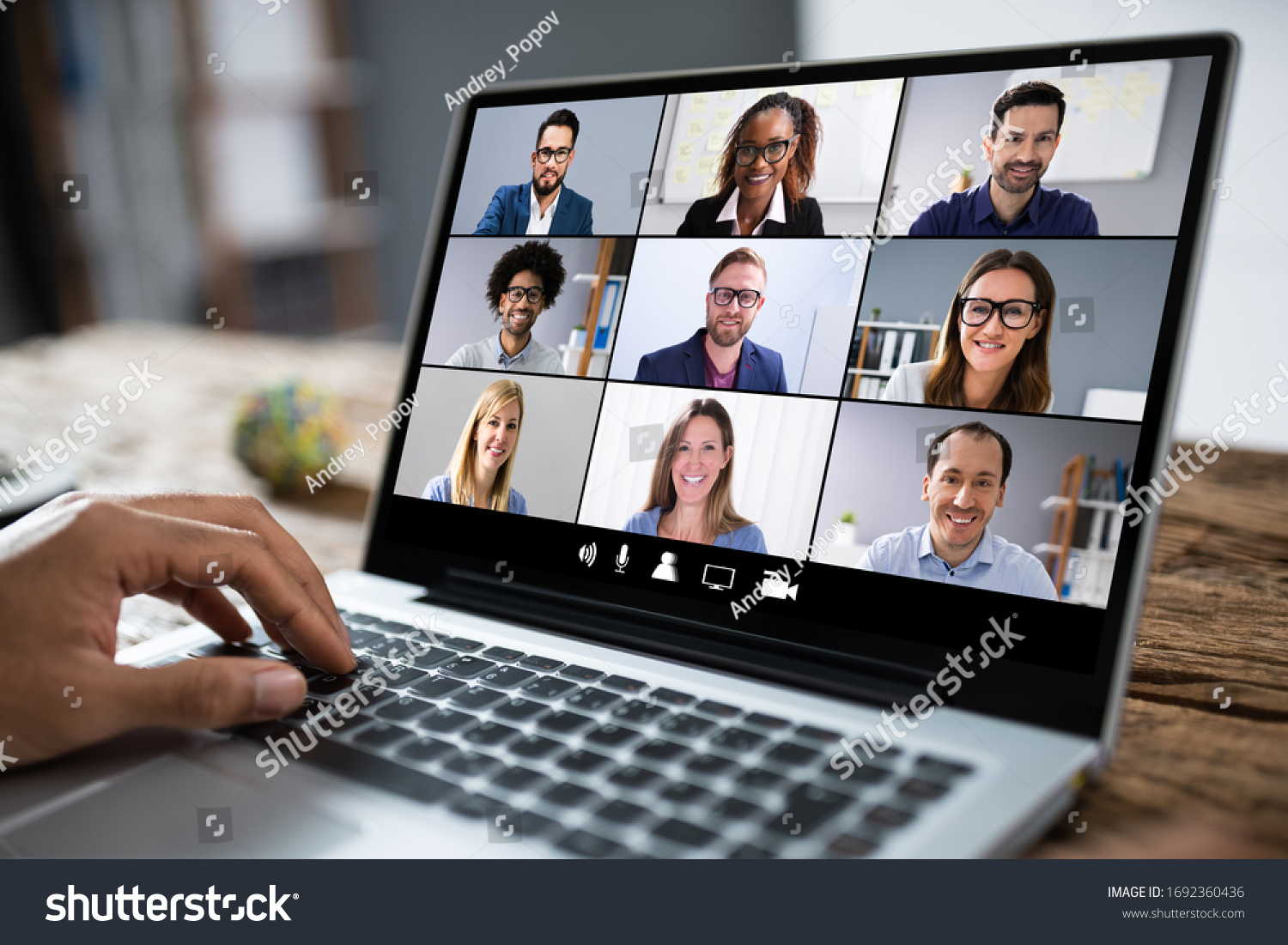 Man Working From Home Having Online Group Videoconference On Laptop #1692360436