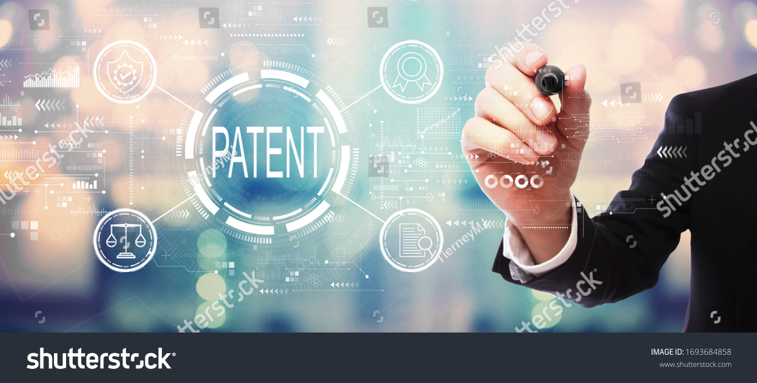 Patent concept with businessman on blurred abstract background #1693684858