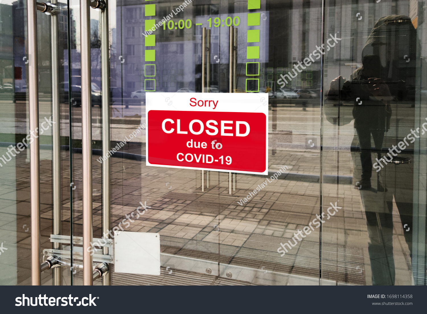Business center closed due to COVID-19, sign with sorry in door. Stores, offices, other commercial buildings temporarily closed during coronavirus pandemic. Economy crisis and lockdown concept. #1698114358