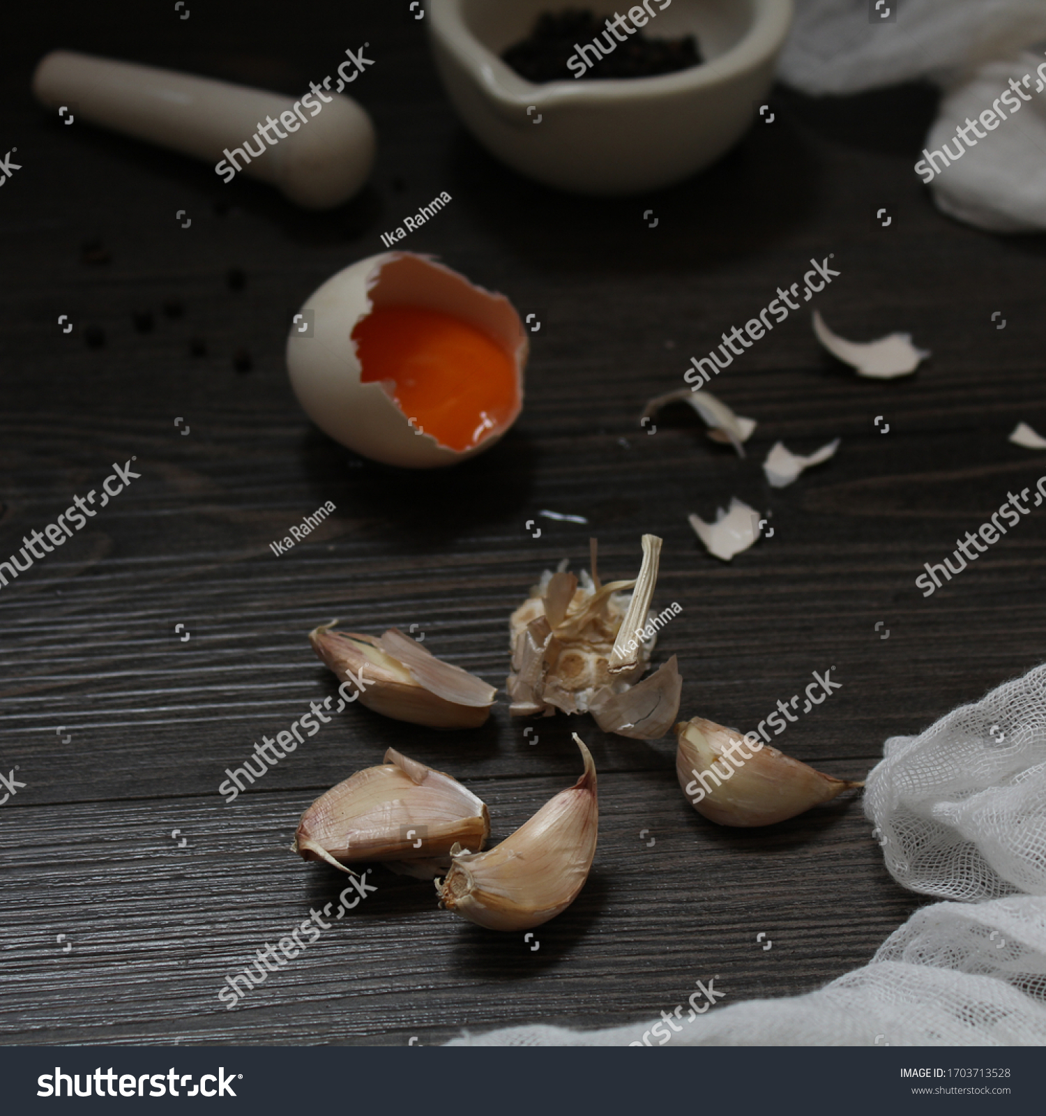 Garlic, Eggyolk, and Blackpepper Preparation for Cooking  #1703713528