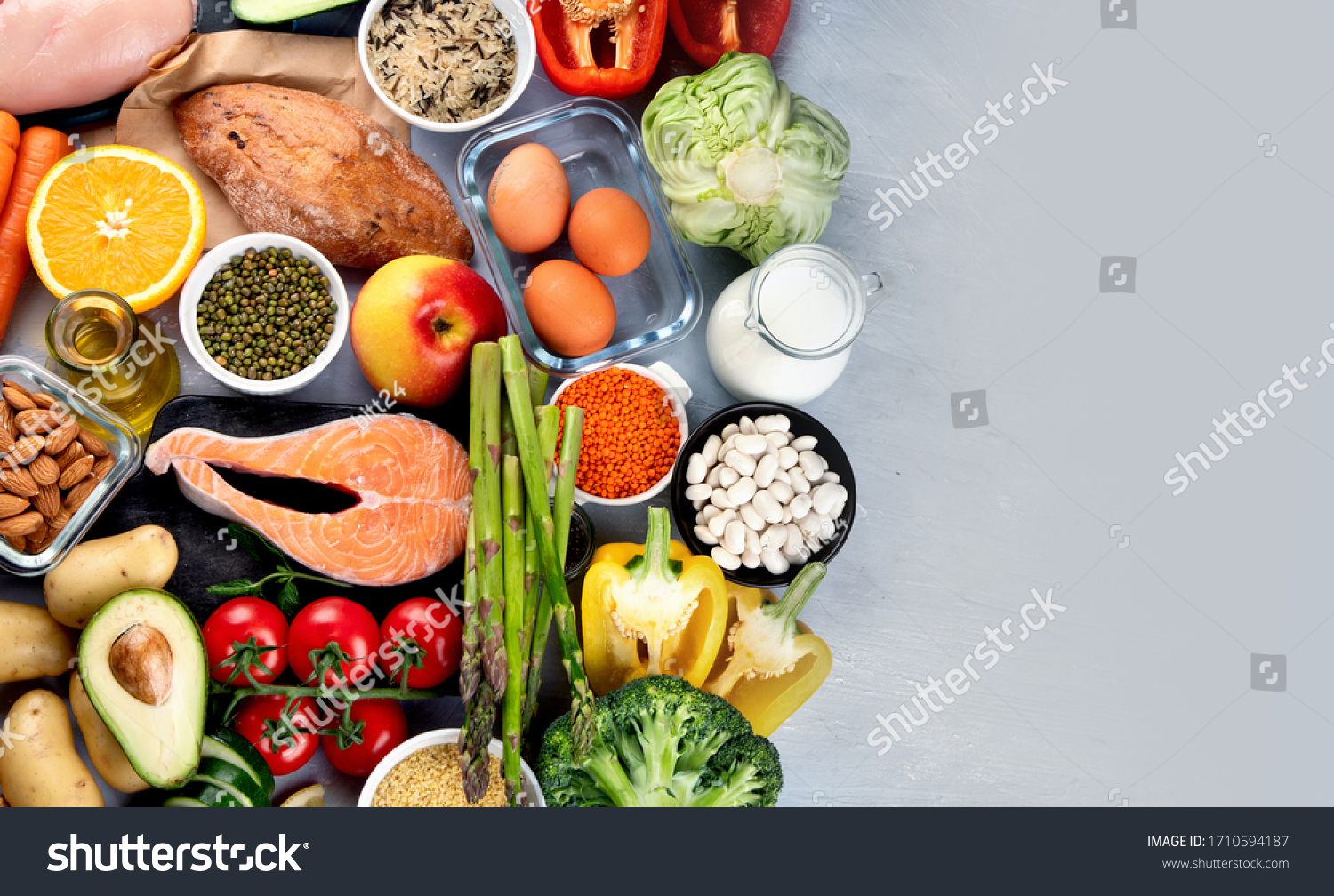 Balanced diet food background.. Nutrition, clean eating food concept. Diet plan with vitamins and minerals #1710594187