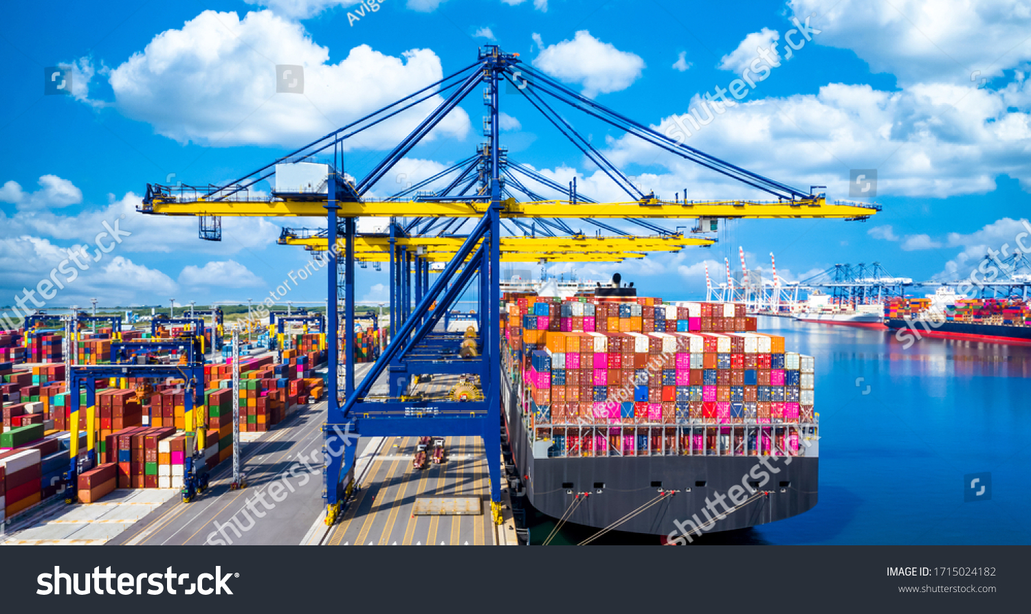 Container ship at industrial port in import export global business worldwide logistic and transportation, Container ship unloading freight shipping, Container cargo industry vessel boat freight. #1715024182