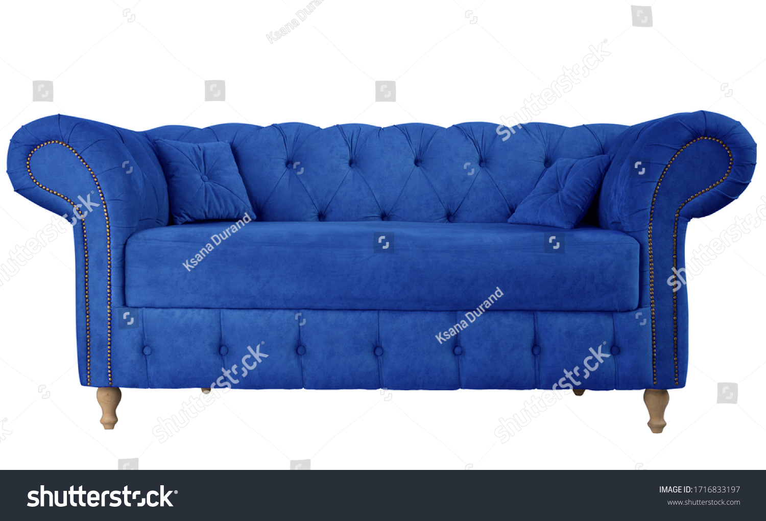 Navy blue sofa with pillows on wooden legs isolated on white. Darck blue suede couch isolated #1716833197