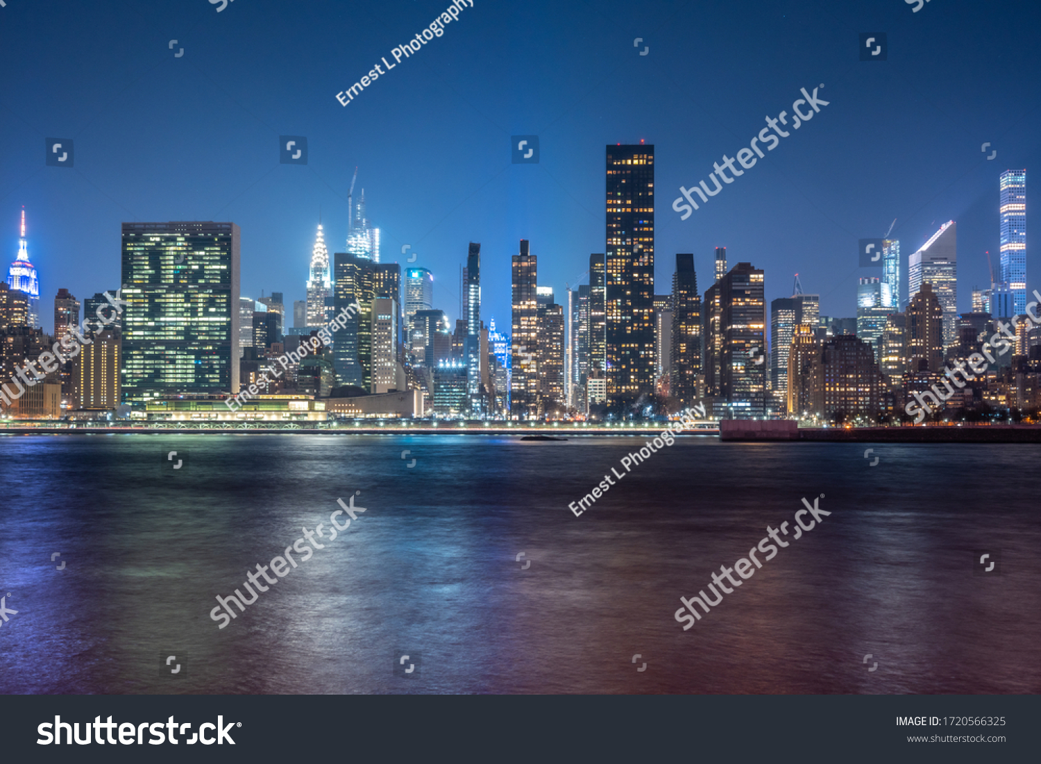 New York City Cityscape during Night Time with busy skyline and dense skyscrapers filling up the sky #1720566325