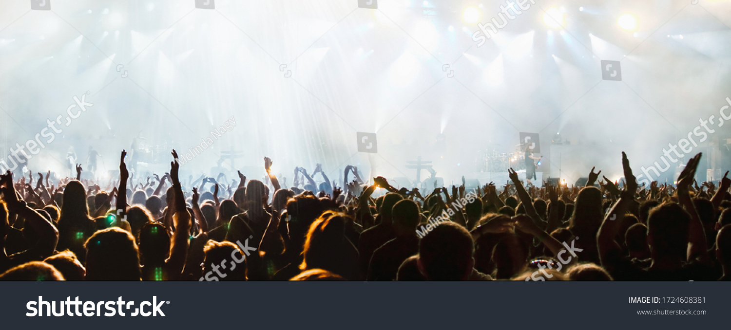 banner of cheering crowd and stage lights with space for your text #1724608381