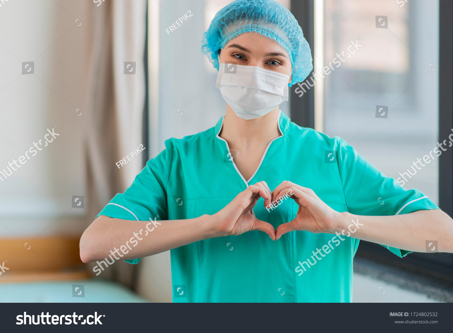 Nurse with hands heart shape  #1724802532