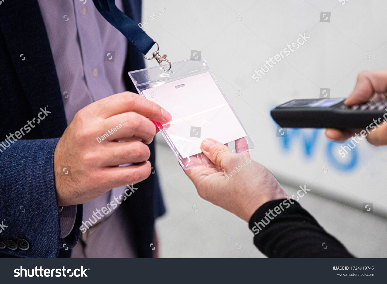 Scanning visitor pass to enter an event or conference #1724919745