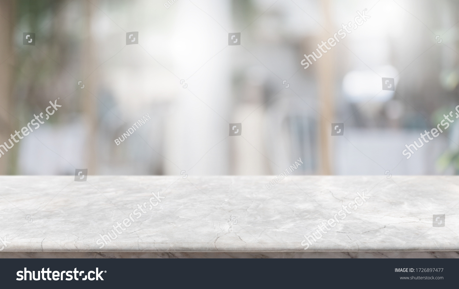 Empty white marble stone table top and blur glass window interior lobby and hall way banner mock up abstract background - can used for display or montage your products. #1726897477