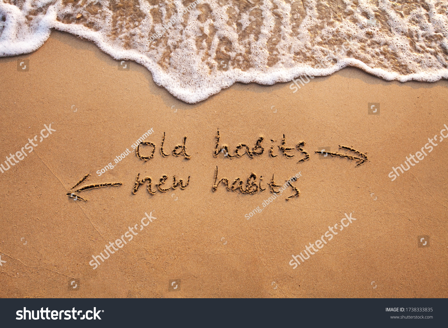 old habits vs new habits, life change concept written on sand #1738333835
