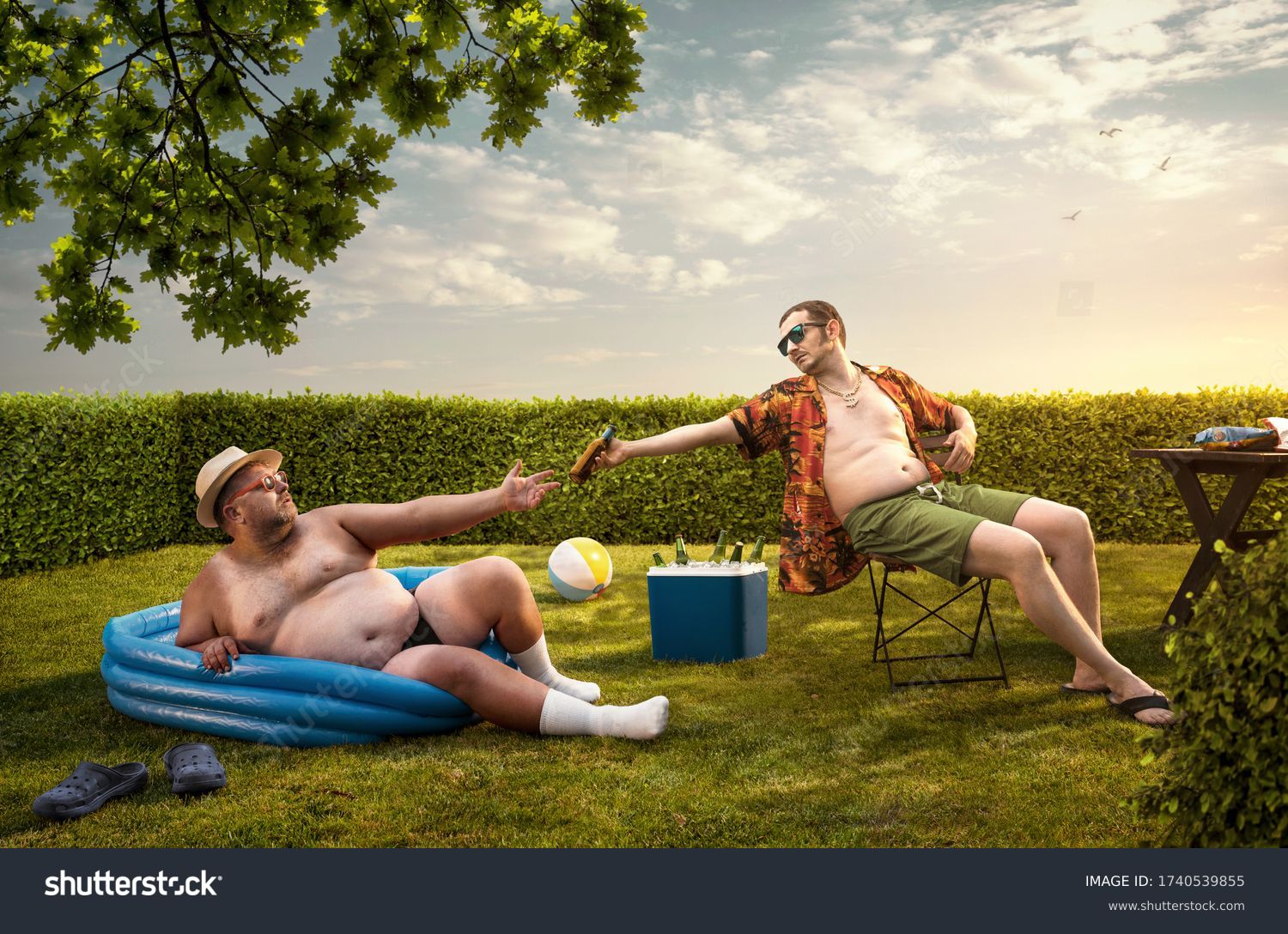 Two funny nerds relaxing in the backyard on the summer day #1740539855