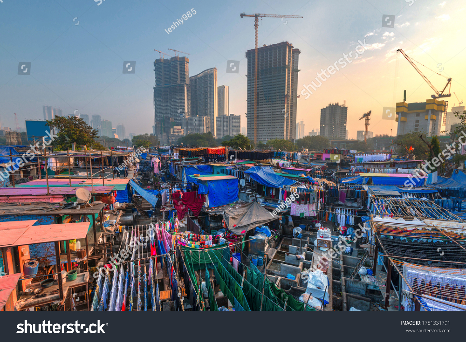 
Selective focus. Dhobi Ghat also known as Mahalaxmi Dhobi Ghat is the largest open air laundromat in Mumbai. one of the most recognizable landmarks and tourist attractions of Mumbai #1751331791