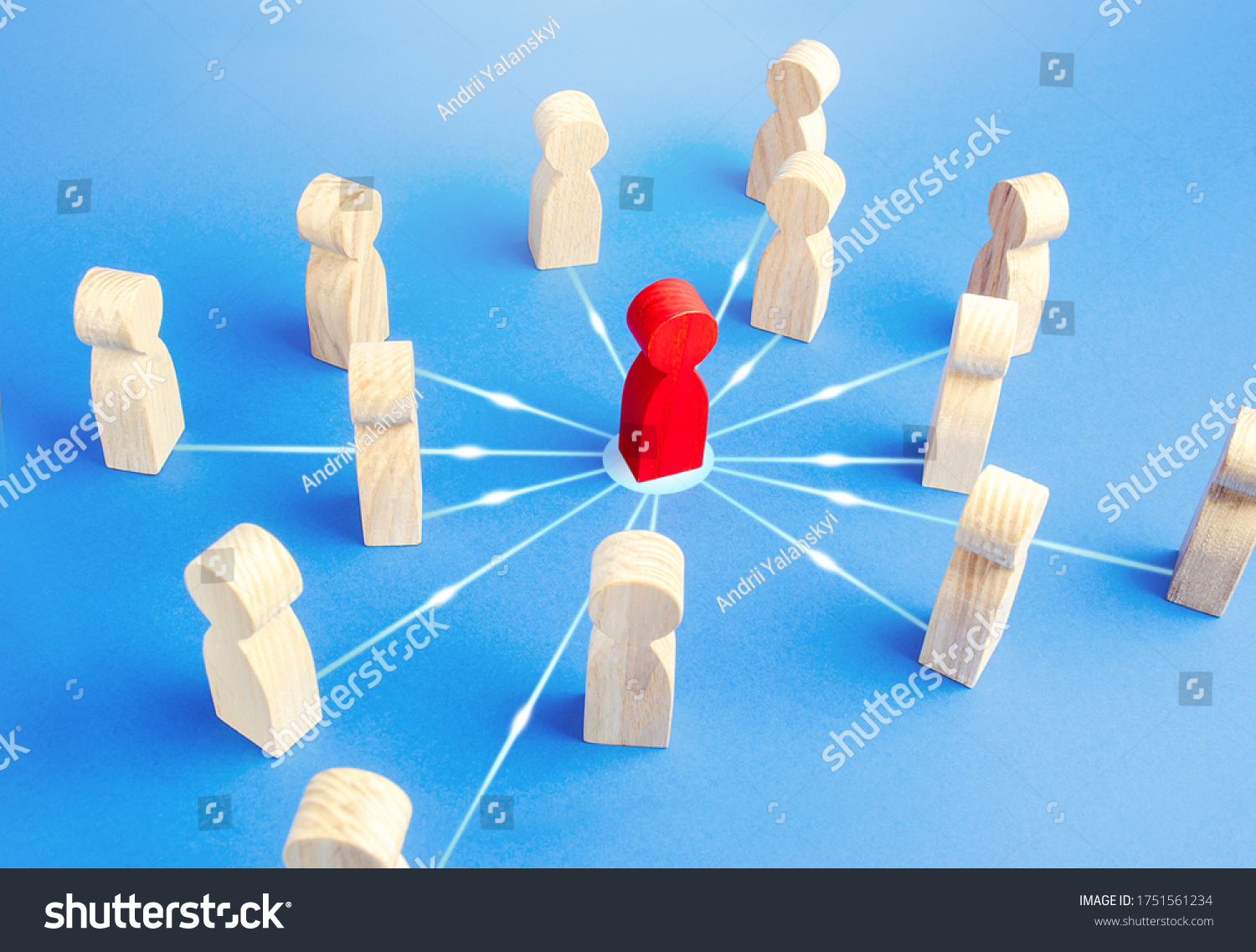 Red person attracts surrounding people. Leadership skills. Followers of leader and his ideas. Cooperation, collaboration to achieve goals. Influence, power. Bringing people together to solve a problem #1751561234