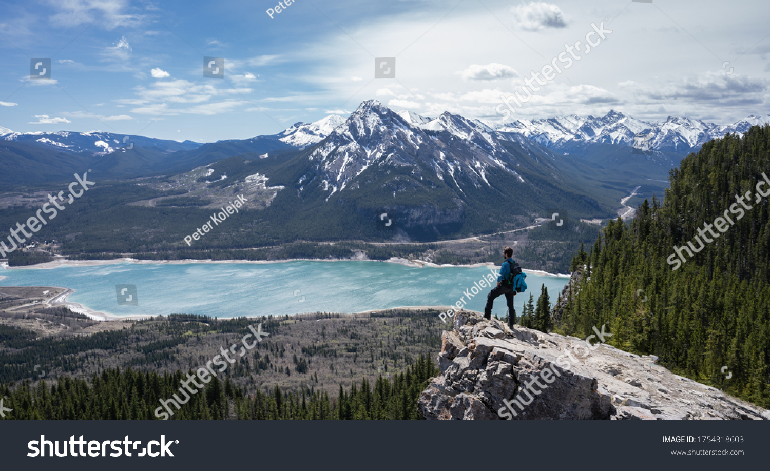 Hiker enjoying beautiful alpine vista in Canadian Rockies at Prairie View Trail, Kananaskis, Alberta, Canada #1754318603