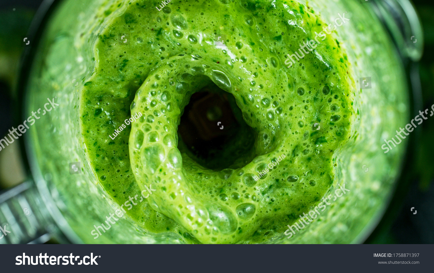 Green fresh smoothie blended in blender, top view. Healthy eating concept. #1758871397