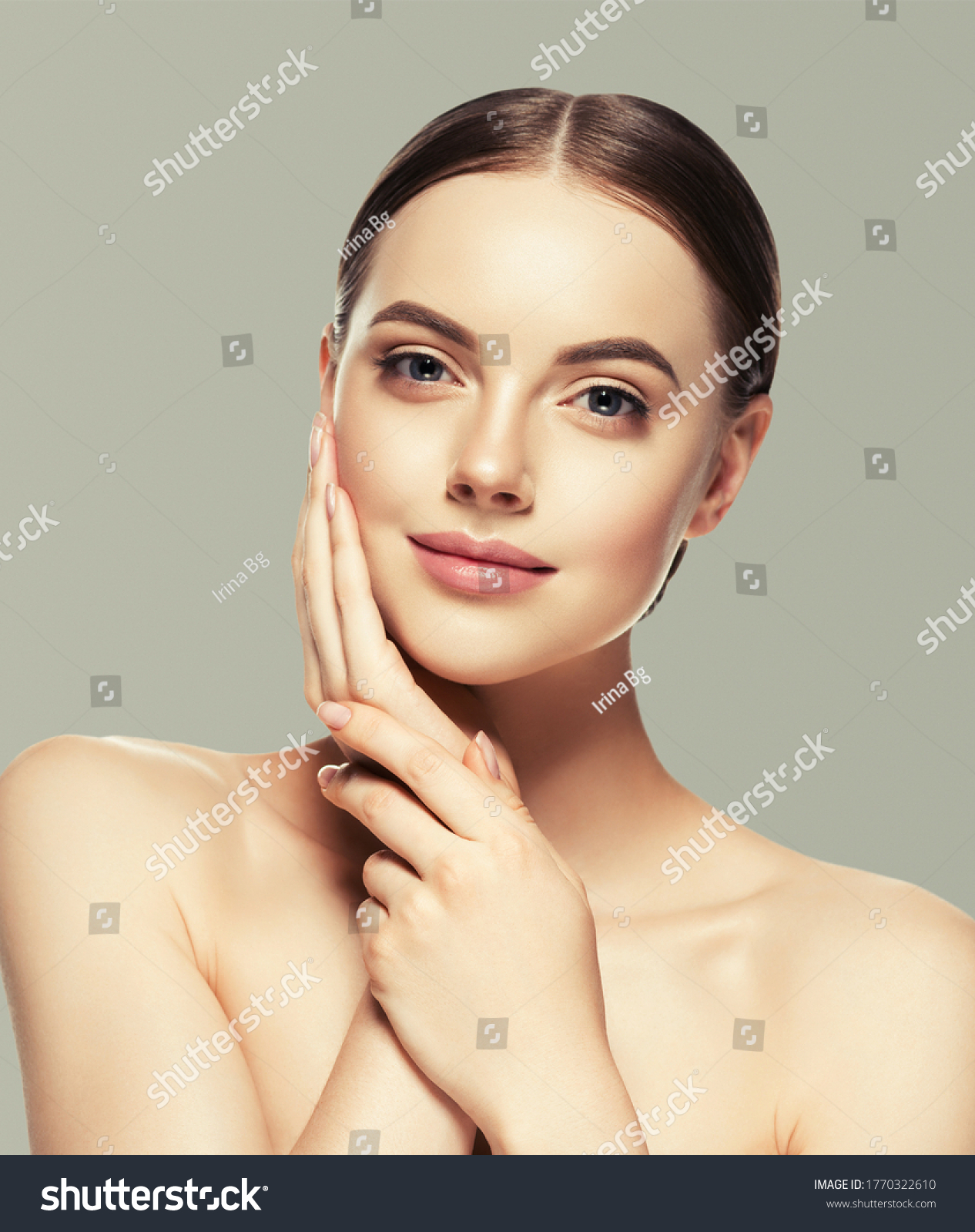 Woman face beauty hand touching   healthy skin natural makeup beautiful female gray background #1770322610