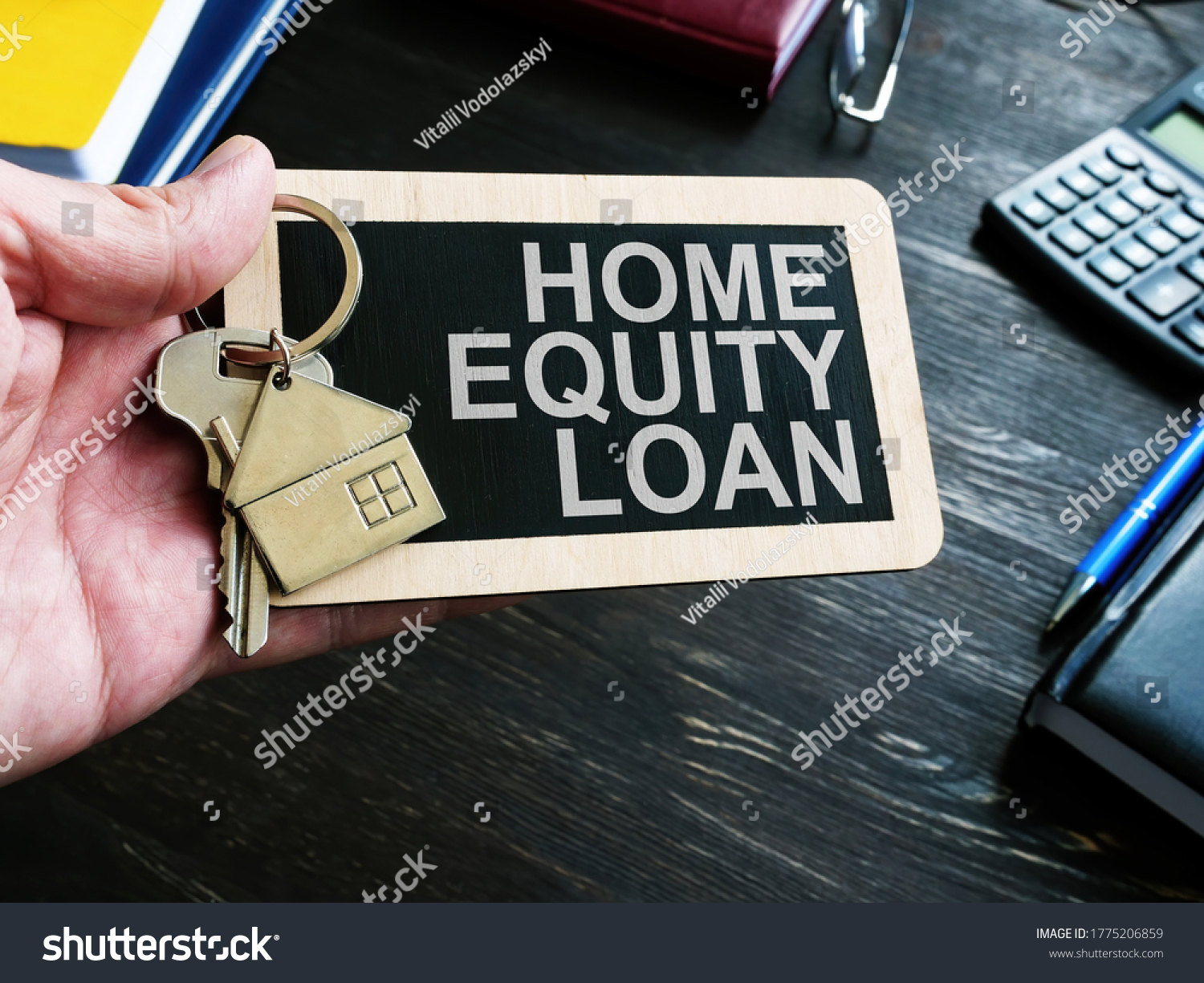 Home Equity Loan sign and key for house. #1775206859