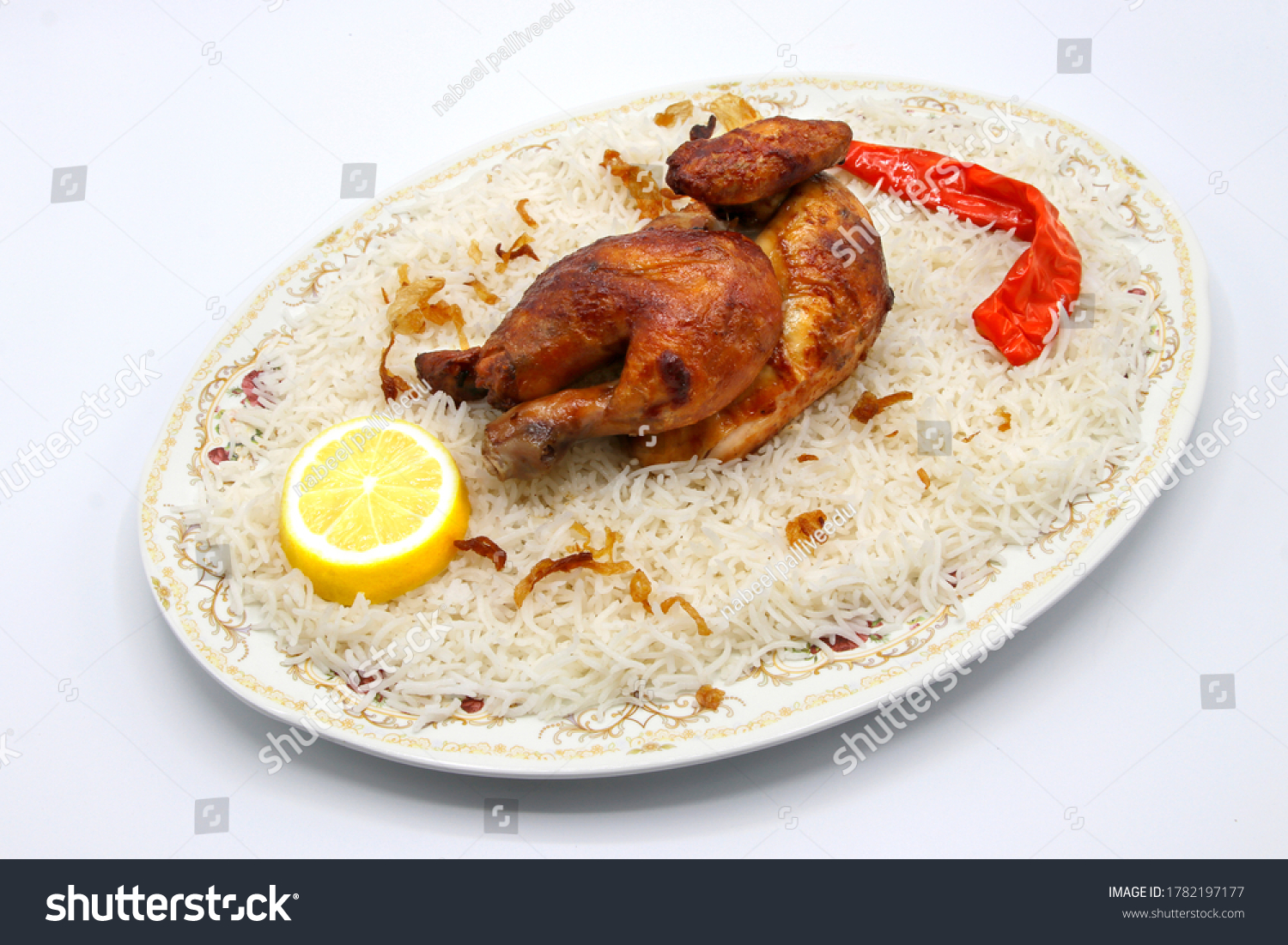 Kabsa is a mixed rice dish that originates from Saudi Arabia but is commonly regarded as a national dish in many Arab states of the Persian Gulf. The dish is made with rice and meat #1782197177