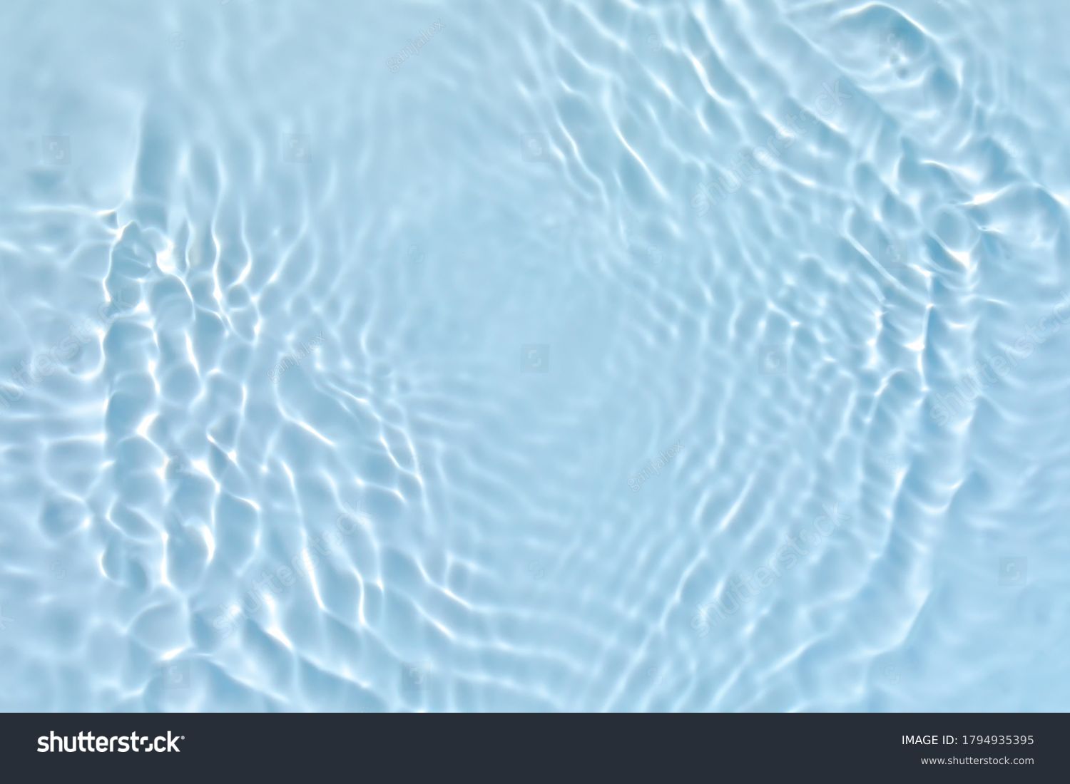 Blurred transparent blue colored clear calm water surface texture with splashes and bubbles. Trendy abstract nature background. Water waves in sunlight. #1794935395