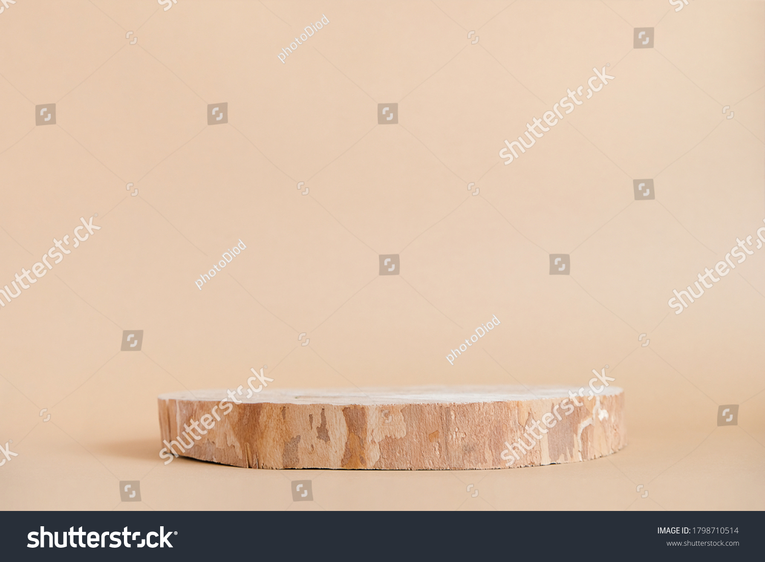 Round wooden saw cut cylinder shape on beige background abstract background. Minimal box and geometric podium. Scene with geometrical forms. Empty showcase for eco cosmetic product presentation #1798710514