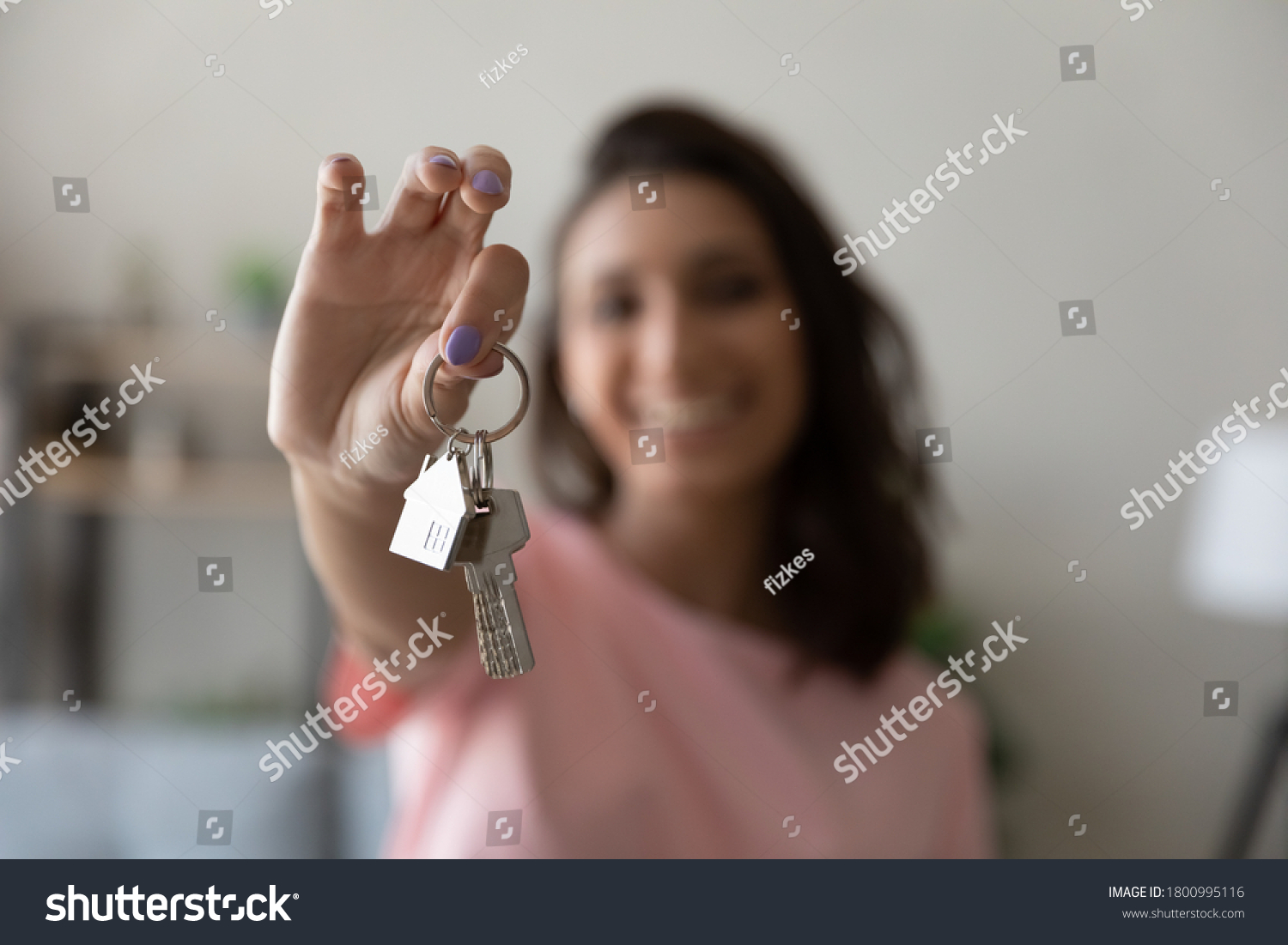 Crop close up of female tenant renter show praise house keys moving to first own new apartment or house, happy woman owner buy purchase home, relocate to dwelling, rental, rent, ownership concept #1800995116