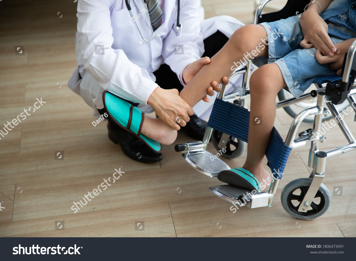Doctor checking disabled person pateint leg at hospital, Muscle weakness #1806473491