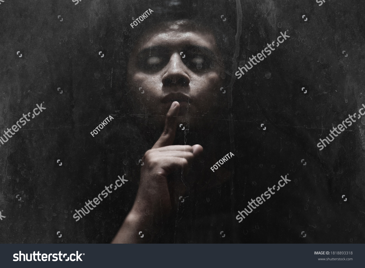 Man possessed on dark background #1818893318