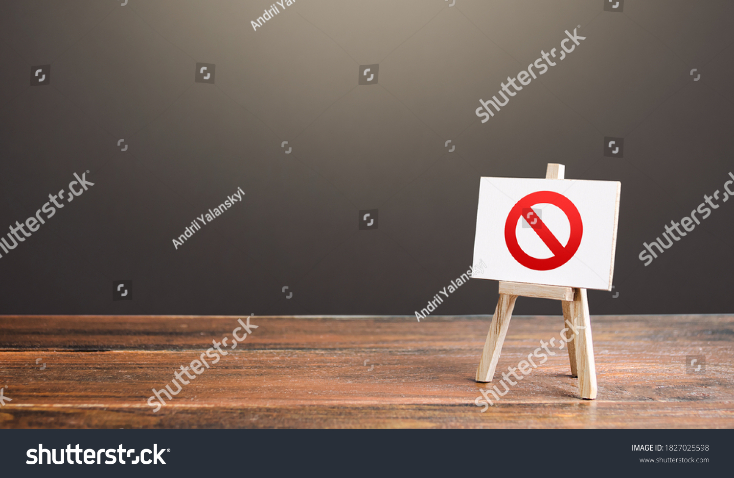 Easel with the prohibition sign NO. Restricted area. Restrictions and sanctions. Inaccessibility. Blocking. Out of stock. Ban and Embargo. Failed strategy. Denying entry, stopping action processes. #1827025598