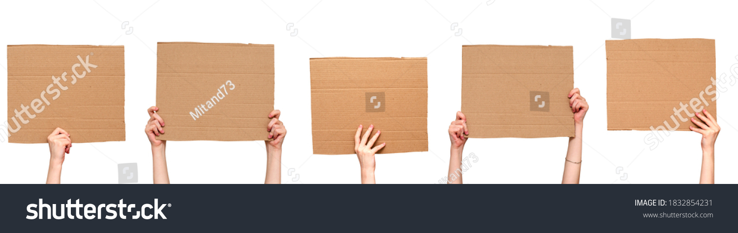 Posters of cardboard in his hands. Isolated on white. Set. Copy space. #1832854231