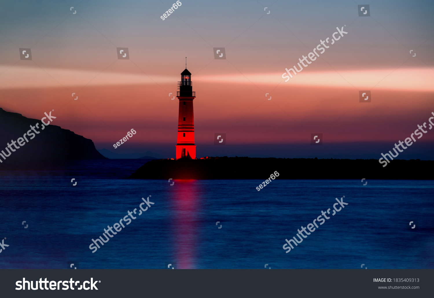 Lighthouse guiding ships at dusk #1835409313