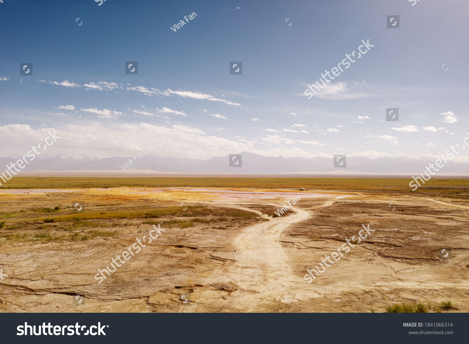 Wide deserted land with curve path. #1841066314