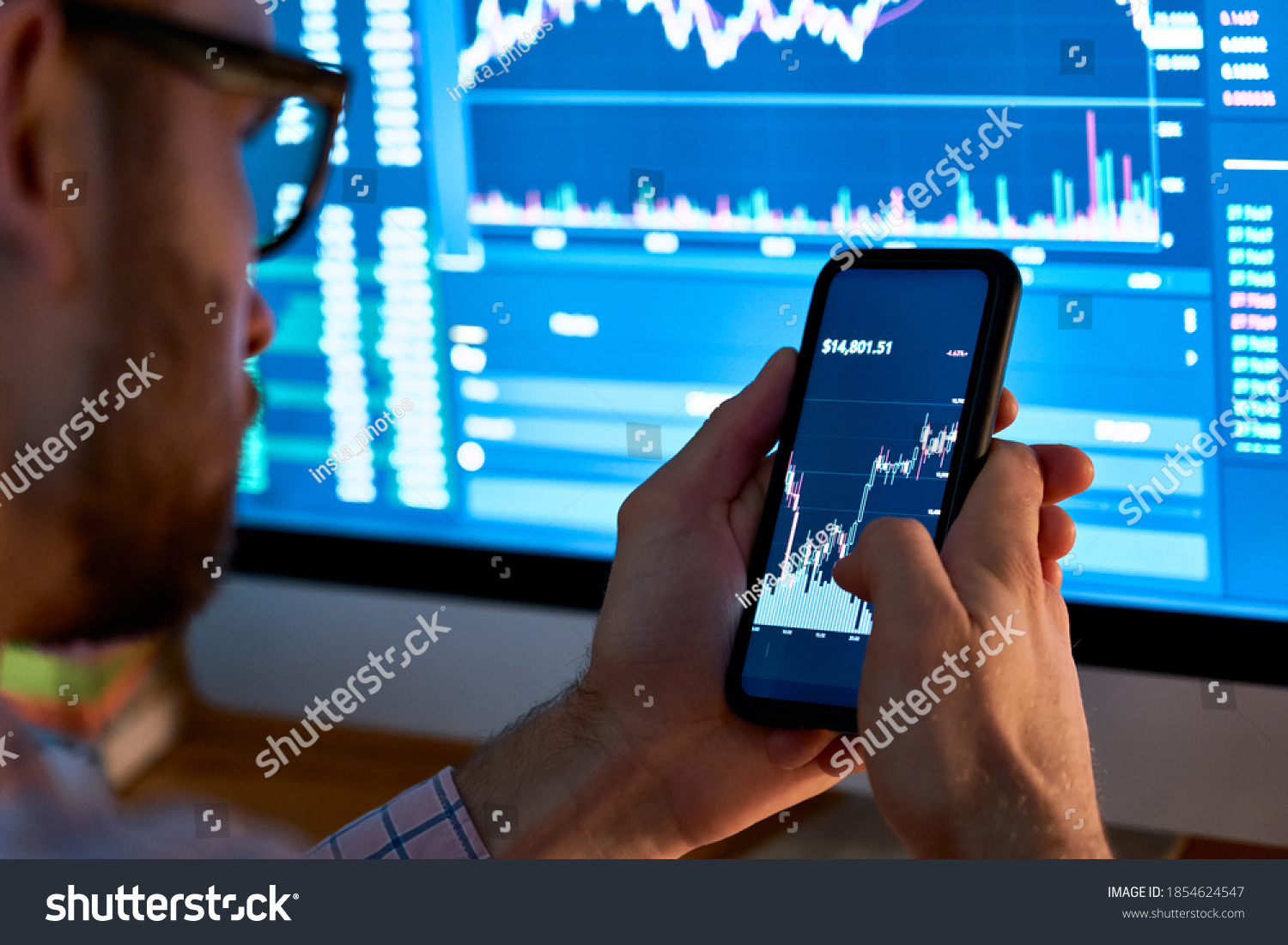 Business man trader investor analyst using mobile phone app analytics for cryptocurrency financial stock market analysis analyze graph trading data index investment growth chart on smartphone screen. #1854624547