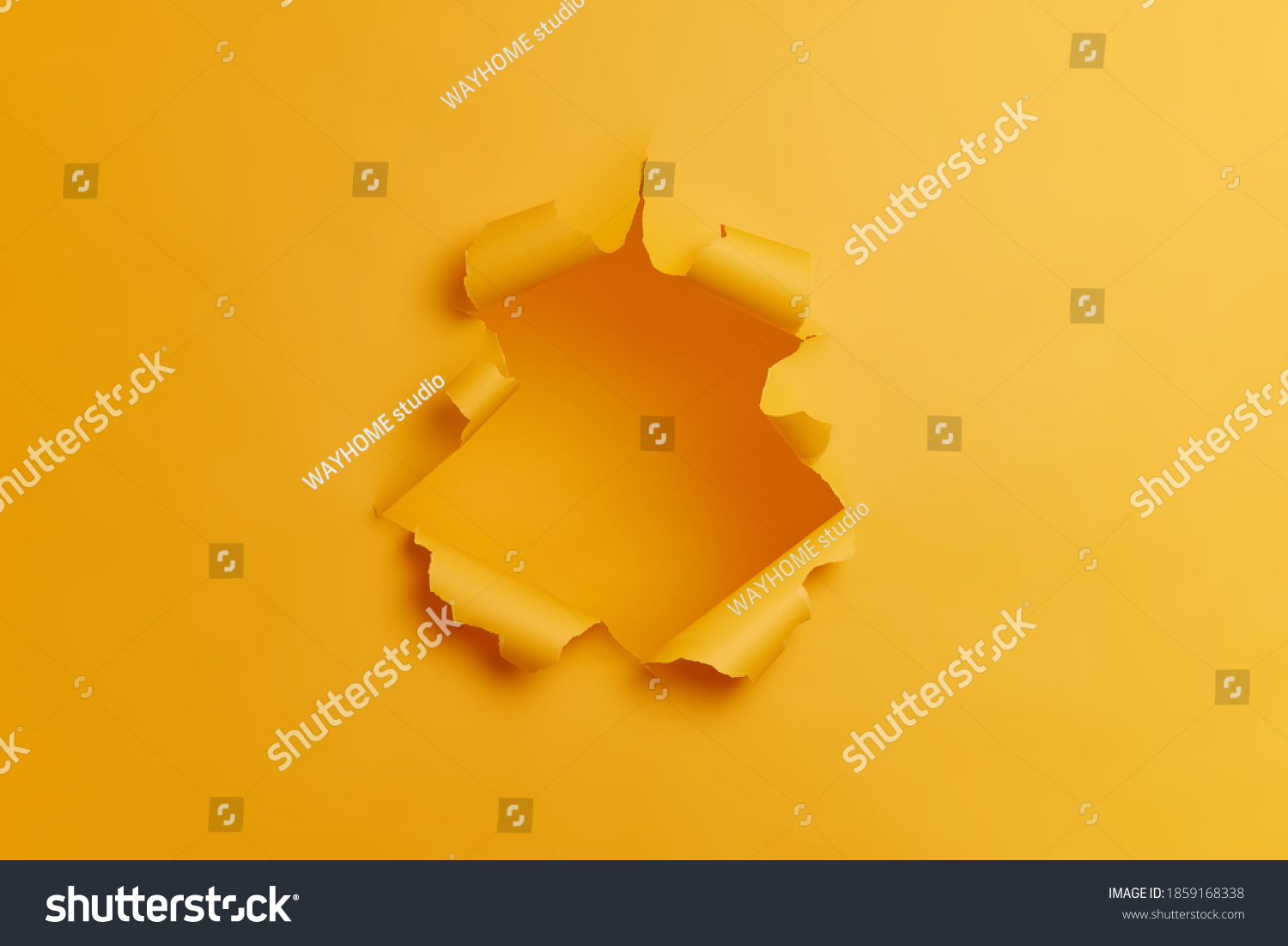 Big paper hole in center of yellow background. Blank space to insert your advertising content promotion or text information. Torn ripped studio wall. Breakthrough concept. No people in shot. #1859168338