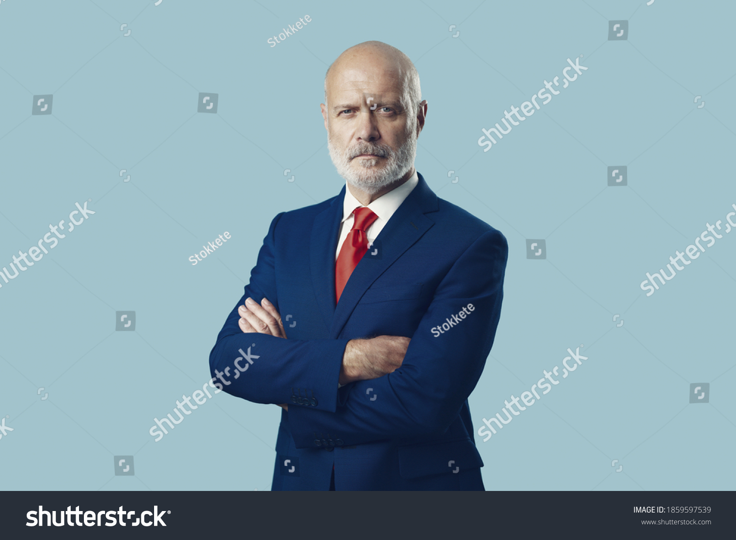 Confident corporate businessman or politician posing and looking at camera #1859597539