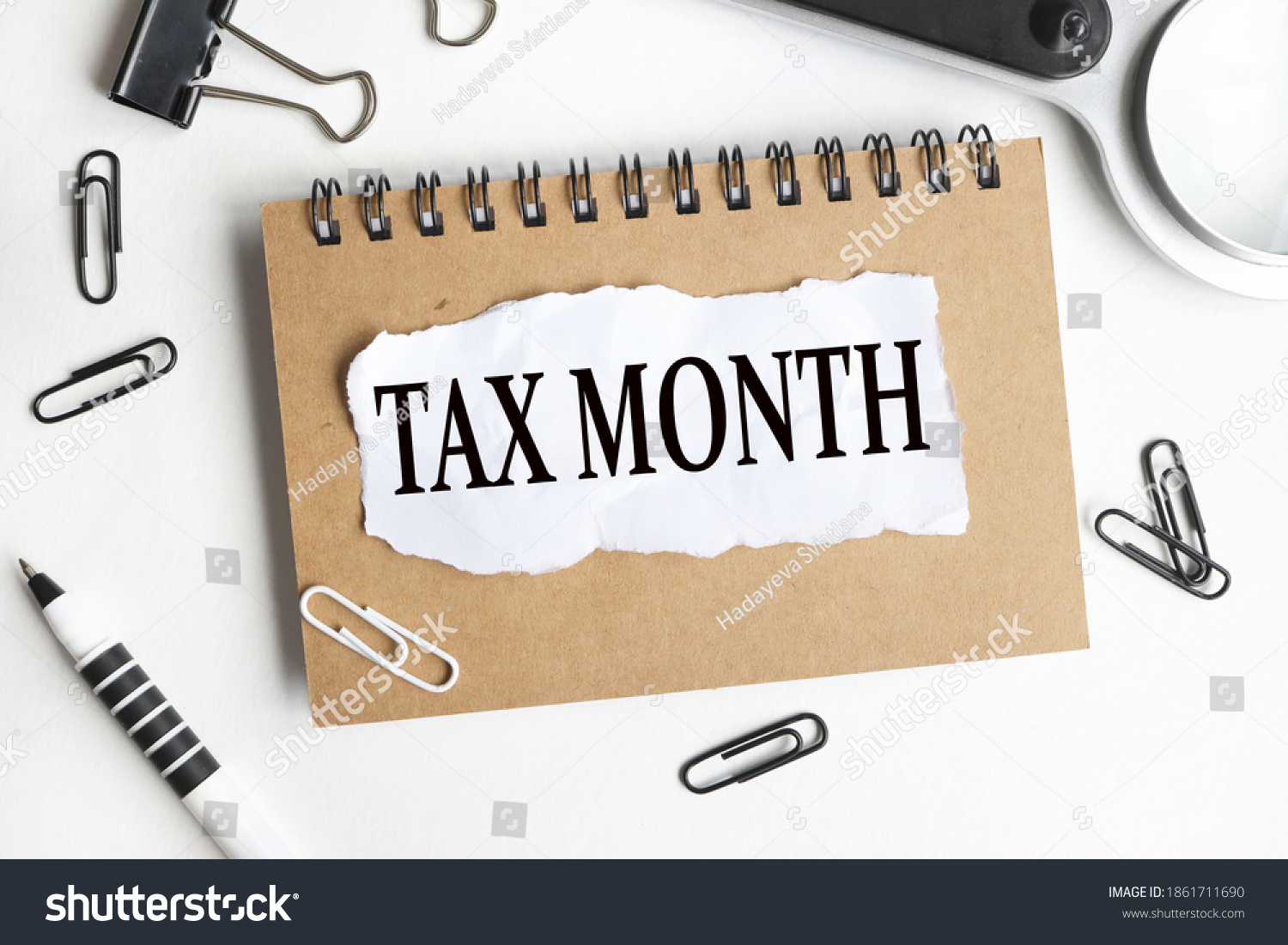 TAX MONTH, text on white paper on white background #1861711690