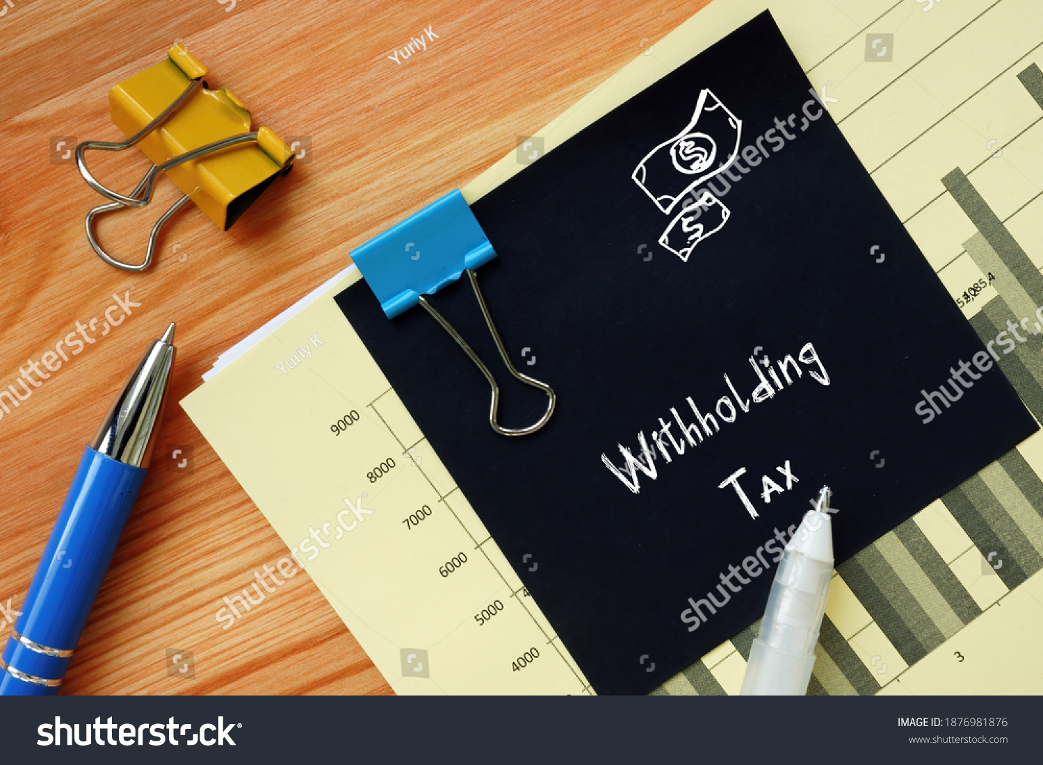 Financial concept meaning Withholding Tax with phrase on the sheet. #1876981876
