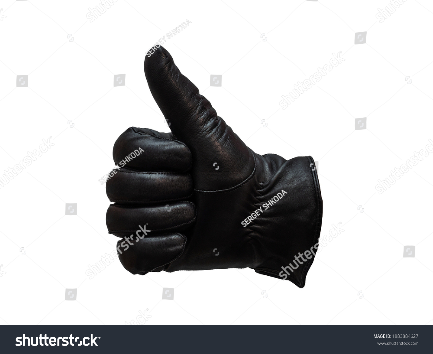 black leather glove shows gesture thumb up. isolated white background. #1883884627