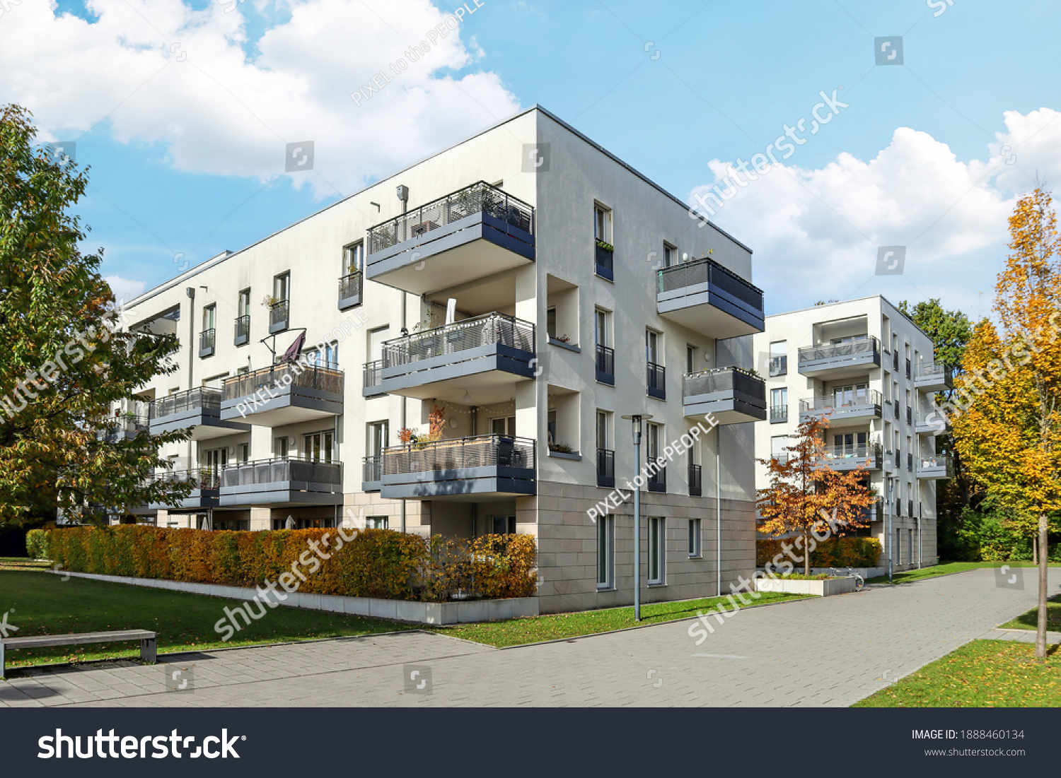 Residential area with ecological and sustainable green residential buildings, low-energy houses with apartments and green courtyard #1888460134