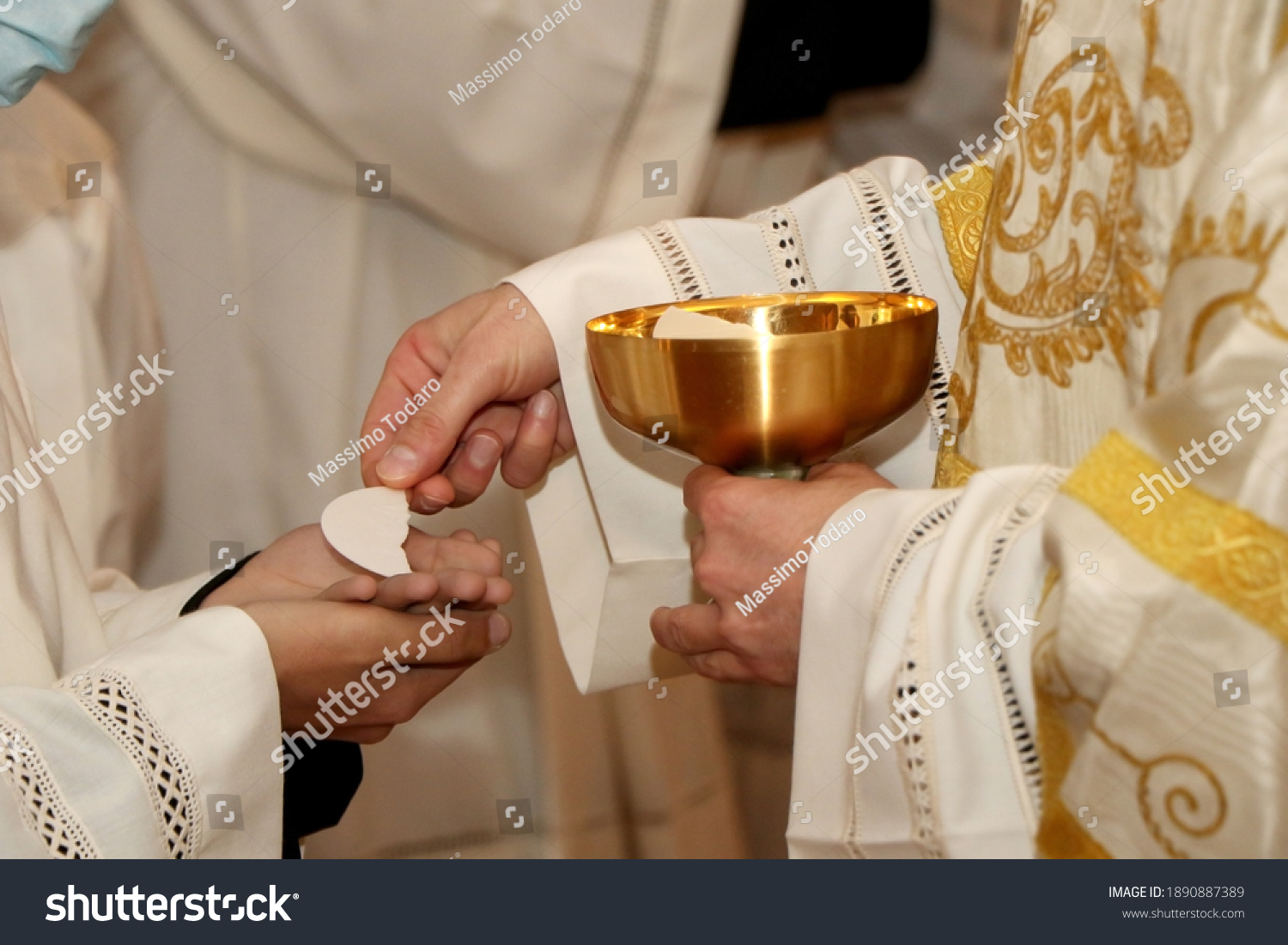 Communion rite during mass in a Catholic church #1890887389