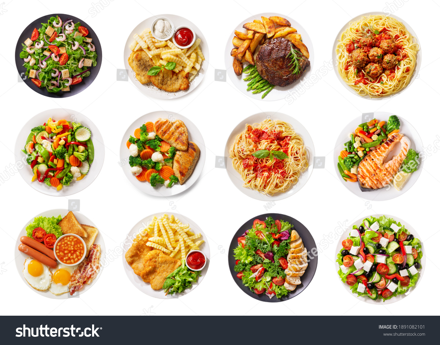 set of various plates of food isolated on a white background, top view #1891082101